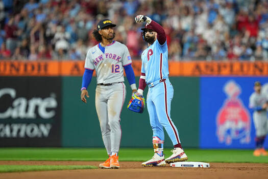 Mets vs Phillies MLB match player stats action featuring Bryce Harper and Francisco Lindor